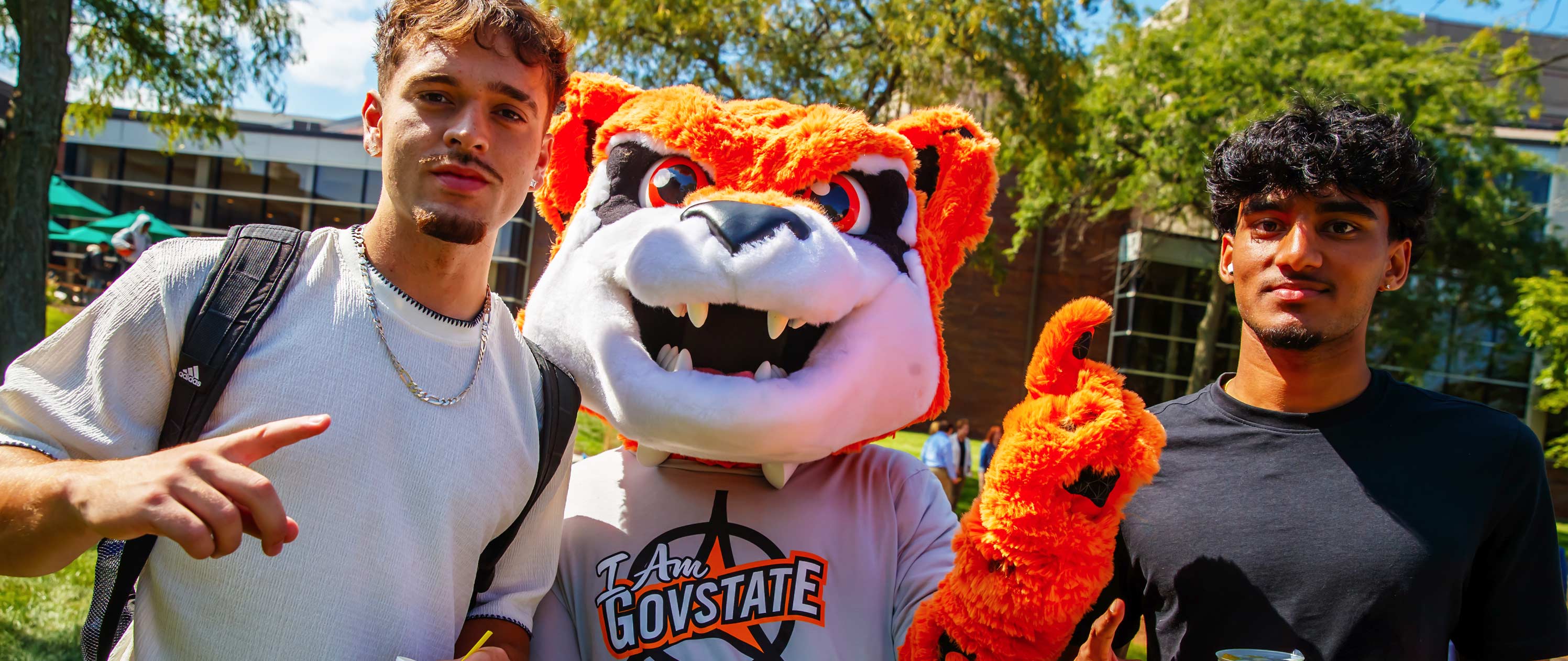 Two students standing next to Jax